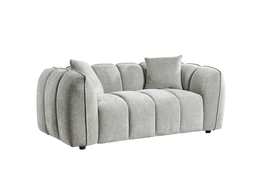 Venice two-seat sofa in light gray textured fabric with channel back and loose cushions