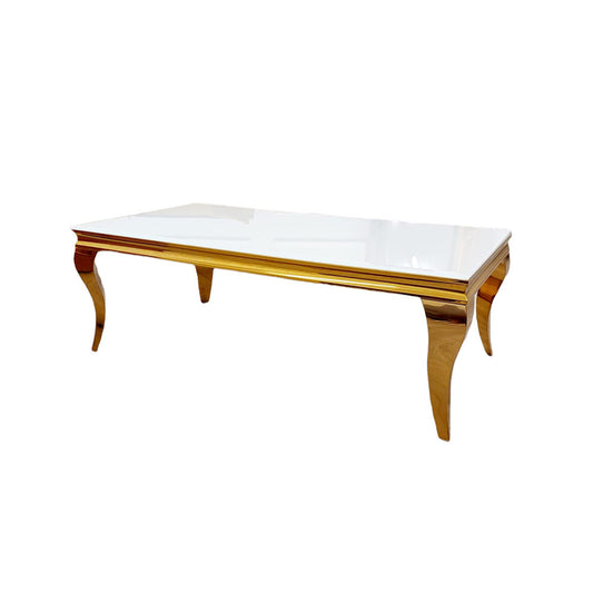 Louis Gold dining table with a white marble top and curved gold legs