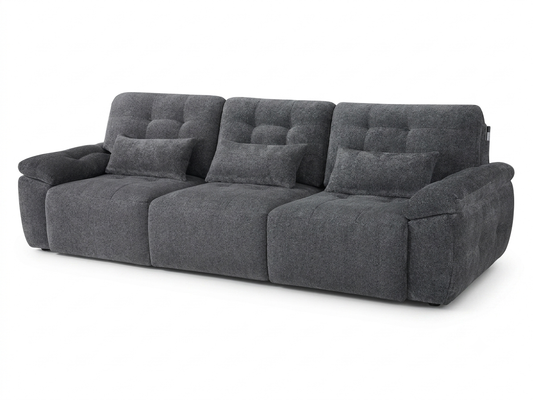 Large dark gray three-seat electric sofa bed with tufted back cushions and matching pillows
