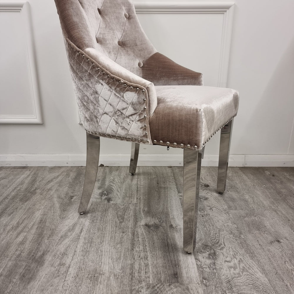 Beige velvet chair detail with quilted side panels, nailhead trim and chrome legs