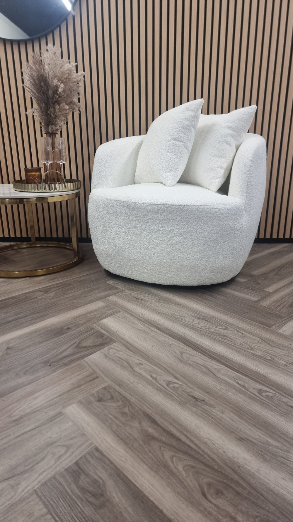 White teddy fabric accent chair with a barrel shape and two loose back cushions