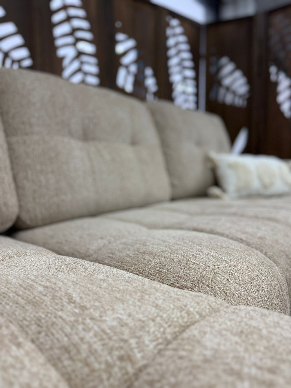 Palermo sofa bed close-up showing textured upholstery and stitched cushions