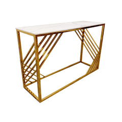 Console table with a white veined top and angular gold metal legs