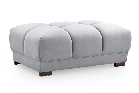 Azzuro footstool in light gray upholstery with a segmented cushioned top and dark wood feet