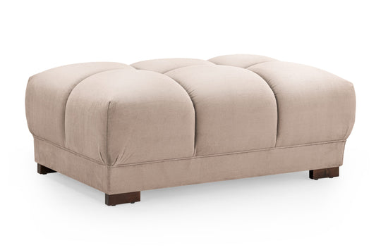 Azzuro footstool with a light beige, segmented cushion and dark wooden feet