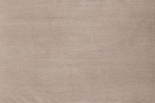 Azzuro footstool fabric close-up showing a light beige woven texture