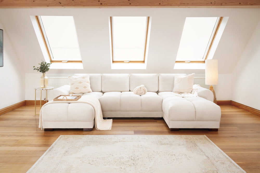 Azzuro cream U-shaped sofa with deep seats and rounded chaise ends