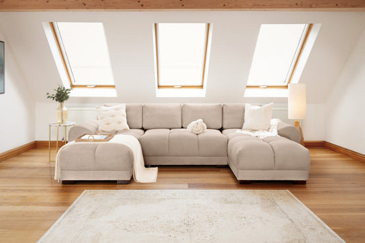 Azzuro beige U-shaped sectional sofa shown front-on with chaise ends