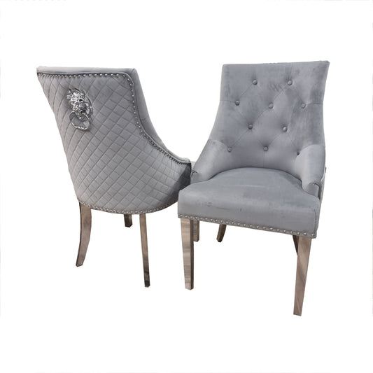 Pair of light grey dining chairs with button-tufted backs, quilted sides and chrome legs