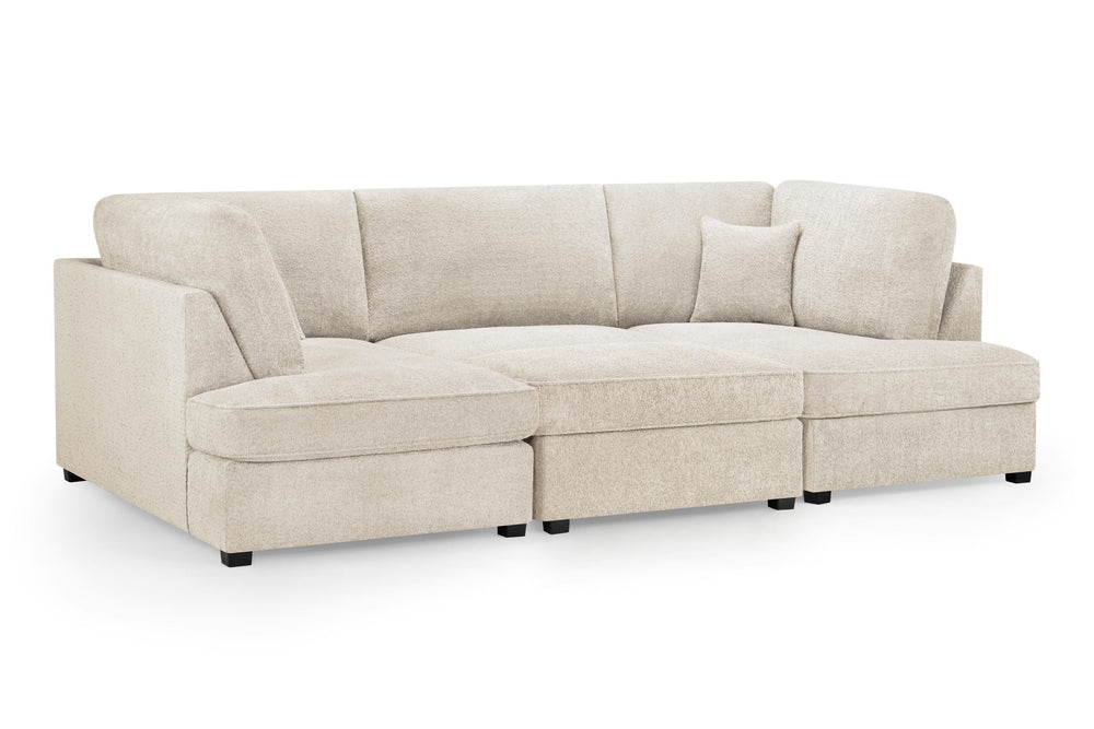 Carnaby sofa arranged as a long sectional with beige upholstery and full back