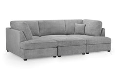 Gray U-shaped sectional sofa with connected seats and throw pillow