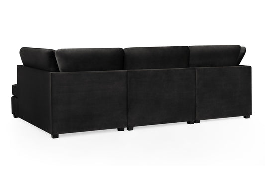 Black sectional sofa viewed from the back, showing its upholstered panels