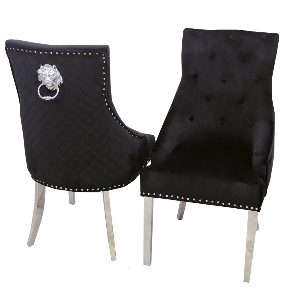 Pair of black velvet dining chairs with chrome legs, tufted backs, nailhead trim and ring pulls