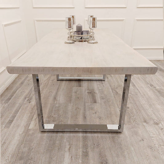 Freya 1.8 dining table with a light pine wood top and chrome metal legs