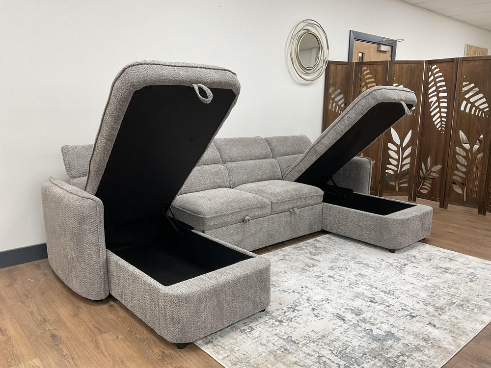 Capri U-shaped sofa bed with two raised storage compartments and a gray textured finish