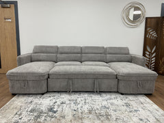 Capri U-shaped sofa bed opened flat, showing its full sleeping surface