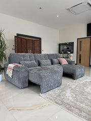 Gray three-seat electric sofa bed extended into a chaise configuration