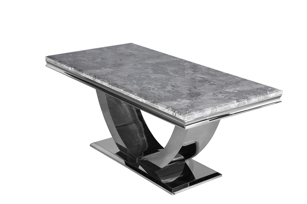 Arial dining table with gray stone top and curved chrome pedestal base