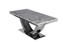 Arial dining table with gray stone top and curved chrome pedestal base