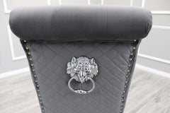 Dining chair back in dark grey velvet with diamond quilting, nailhead trim and lion-head ring pull