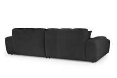 Rear view of the large corner sofa with upholstered back panels and broad arms