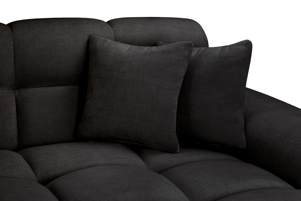 Close-up of dark gray sofa back cushions and padded seats