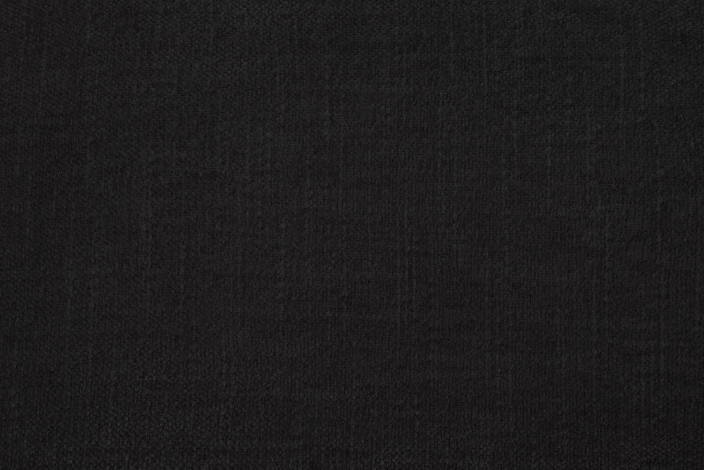 Close-up of the sofa's dark gray woven upholstery fabric