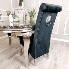 Black velvet dining chair with quilted back, silver legs and decorative ring pull