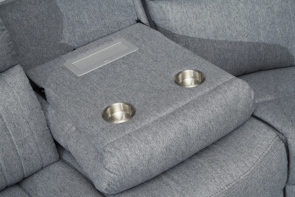 Power recliner sofa center console with two cup holders and a storage panel