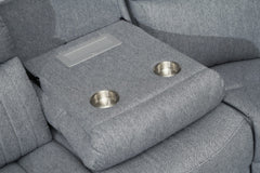 Power recliner sofa center console with two cup holders and a storage panel