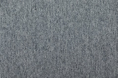 Close-up of the sofa's textured gray fabric