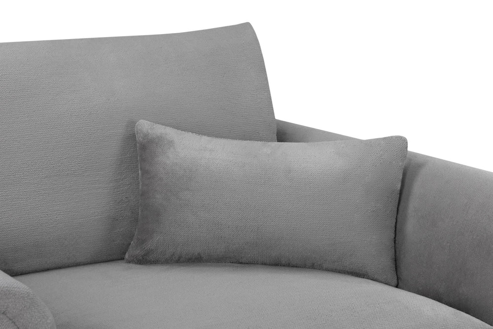 Close-up of the gray armchair's lumbar cushion, backrest and seat upholstery