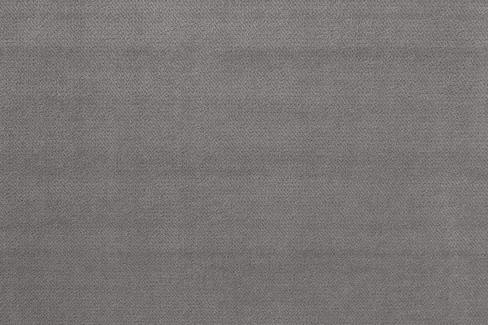 Close-up of the sofa's gray woven upholstery