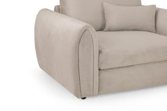Mirabel armchair close-up of the rounded upholstered arm and cushioned seat