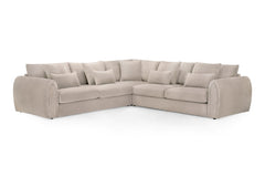 Mirabel large corner sofa with scatter cushions and rounded arms in light beige