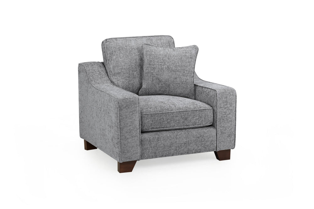 Nebraska gray fabric armchair with loose back cushions and dark wood feet