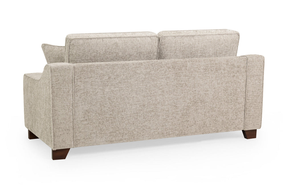 Nebraska three-seat sofa, showing its upholstered back and dark wood feet