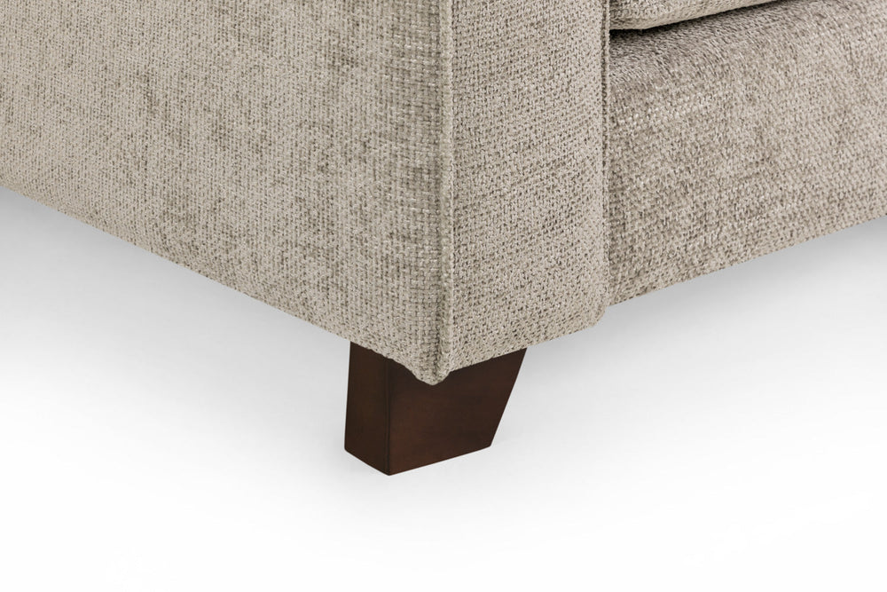 Nebraska sofa corner with a dark wood foot and beige woven upholstery