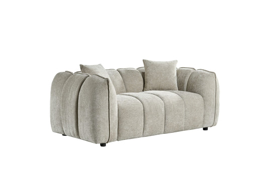 Venice two-seater sofa in light gray textured fabric, with rounded full-back cushions and two pillows