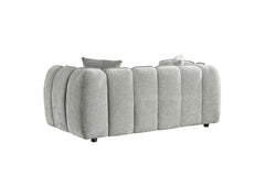Two-seat sofa viewed from the back, with rounded channel upholstery and short black legs