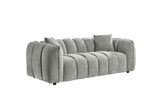 Venice three-seat sofa in light gray textured fabric with channel tufting and loose cushions