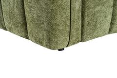 Close-up of the sofa's upholstered base and short black foot