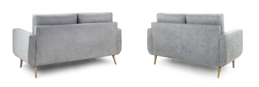 Two-seat sofa shown from behind, with broad arms and tapered wooden legs