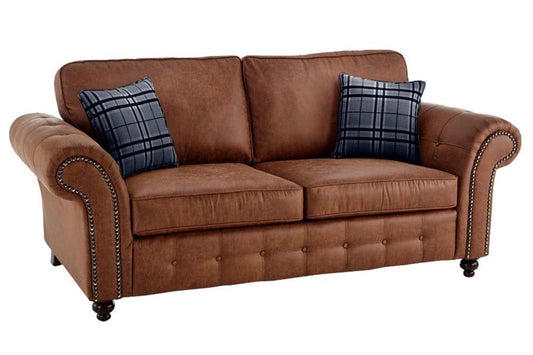 Oakland three-seat sofa in brown with rolled arms, buttoned base, nailhead trim and two cushions