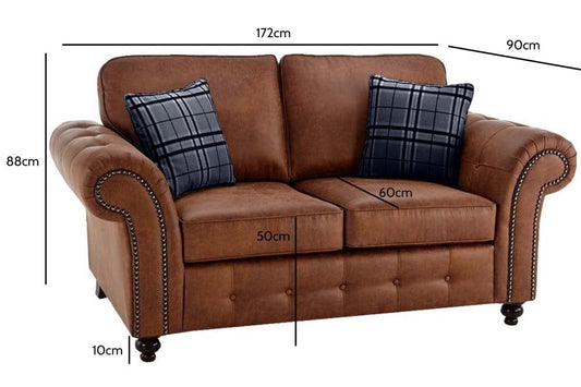 Two-seat brown sofa with plaid cushions and dimensions marked: 172 cm wide, 90 cm deep, 88 cm high