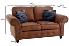 Two-seat brown sofa with plaid cushions and dimensions marked: 172 cm wide, 90 cm deep, 88 cm high