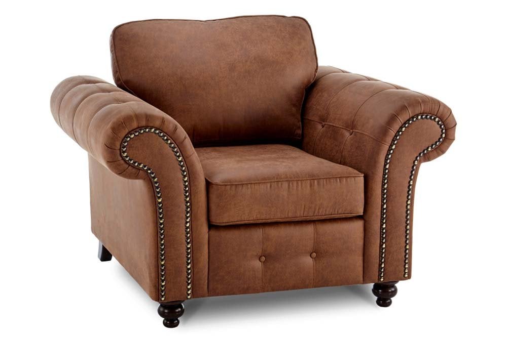 Oakland brown upholstered armchair with rolled arms, nailhead trim and turned legs