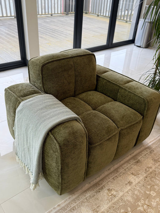Paris Fullback Sofa Armchair in olive green fabric with a light throw draped over one arm