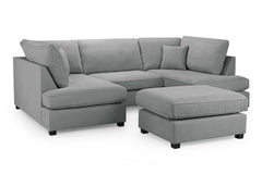 Gray U-shaped sectional sofa with loose cushions and matching ottoman