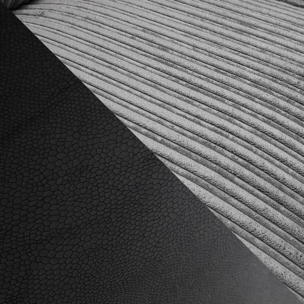 Close-up of ribbed gray upholstery beside textured dark sofa material